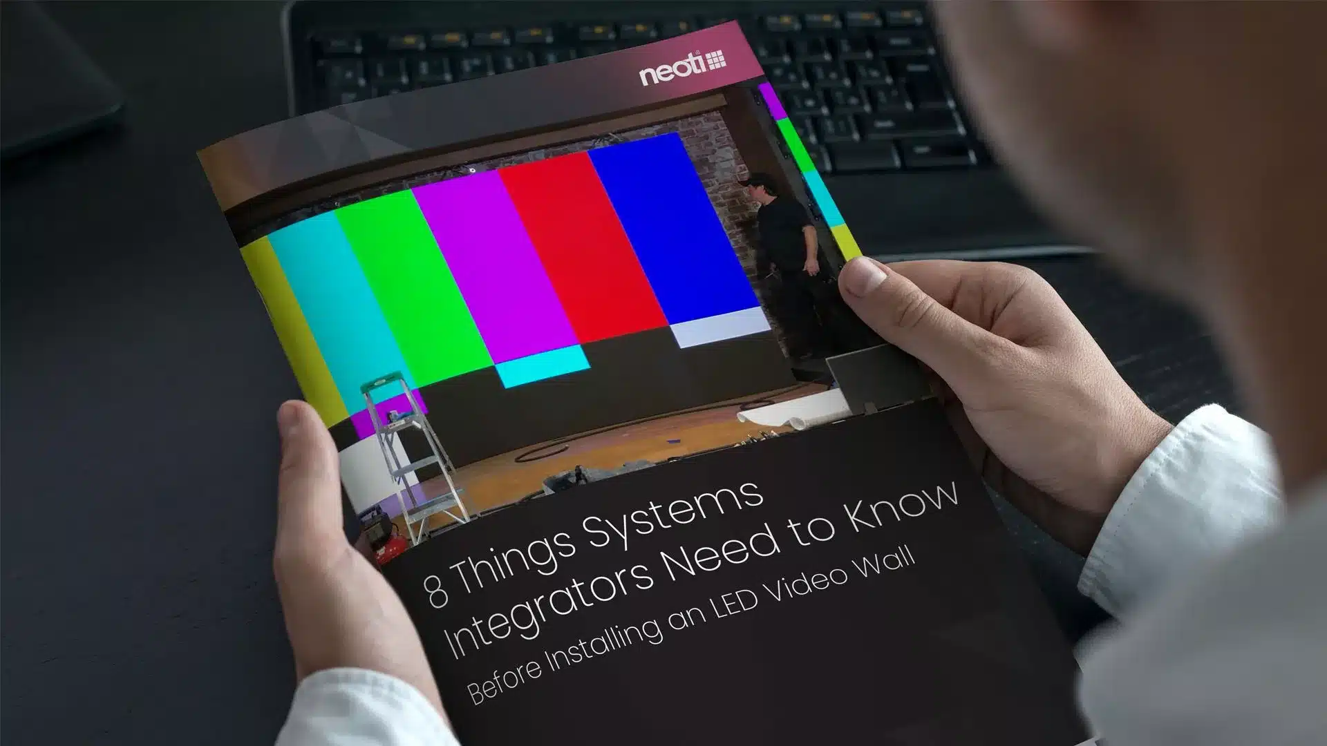 Neoti Whitepaper 8 Things integrators need to know brochure with laptop