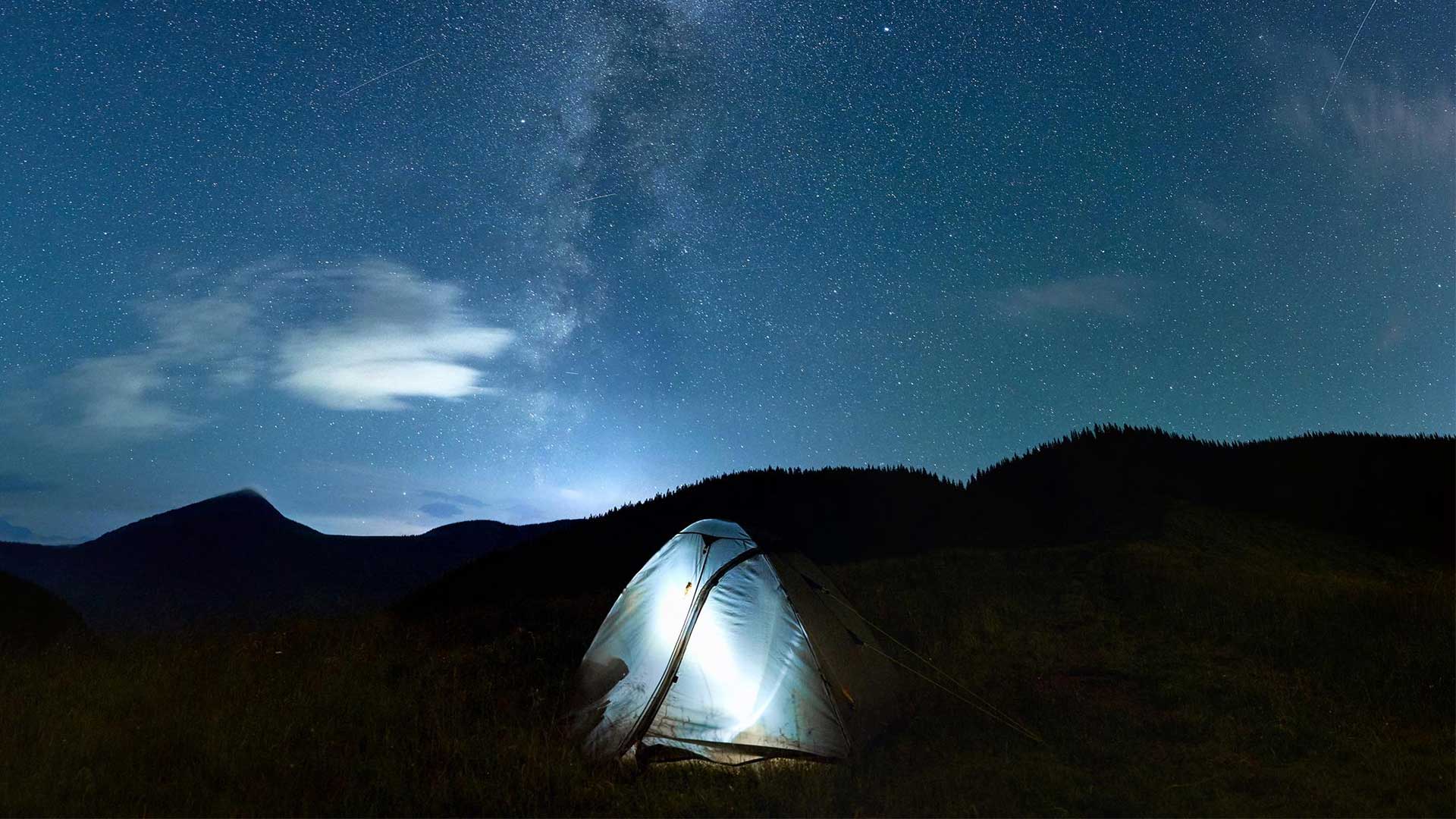 mountain travel camp at night