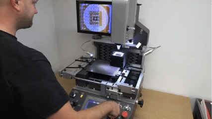 Technician calibrating an LED video wall display screen